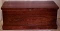 horizontal style oak cedar chest with harvest cushion