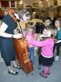 cellist and elementary students