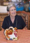 Berkeley Retirement Home and Nursing Home resident at table with Thanksgiving Centerpiece