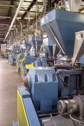 A photo of custom plastic extrusion lines and custom stock tools extrusion lines.