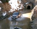The Twin Lakes tunnel is large enough to drive a full-size pick-up through when not diverting water. Photo by Greg Poschman. 