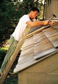 Man providing Roofing Services, Roofing Contractor in Chenoa, IL