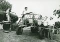 Newton Crouch Sr with Sprayer and Farmers; picture taken in 1950s