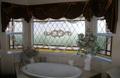 Example of stained glass in bathroom in Elsmere, KY